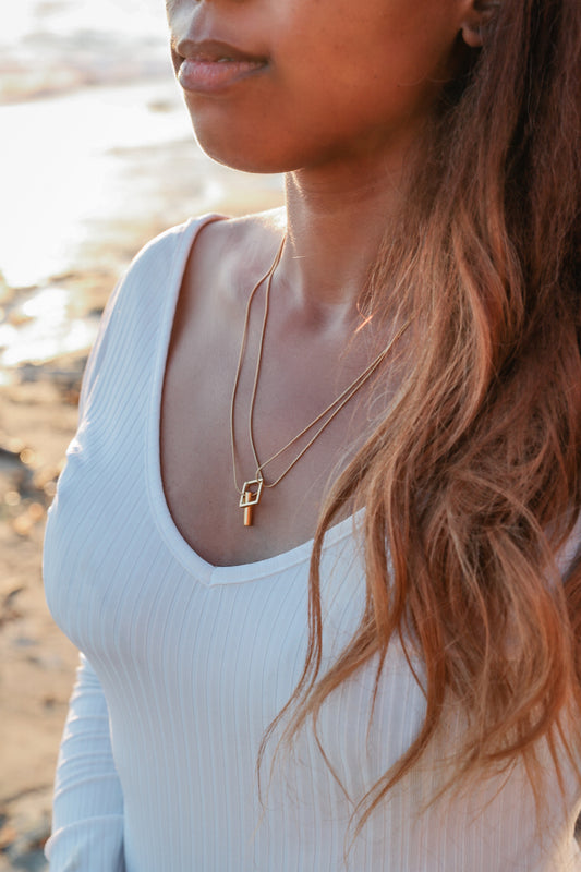 Move on Necklace on model wearing white dress