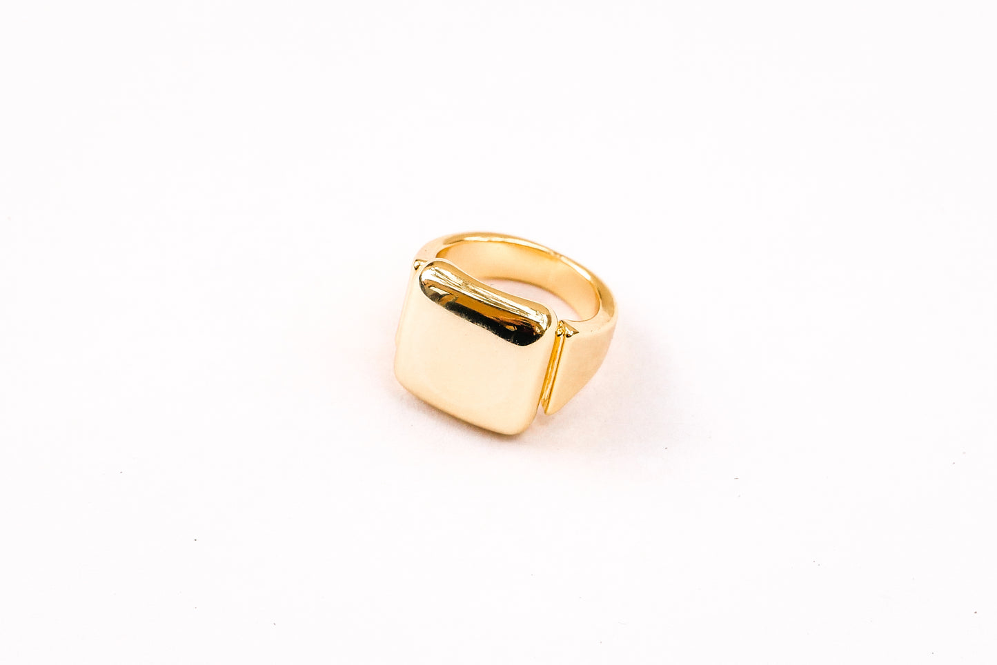 Amor bold ring on white backdrop 45 degree front view