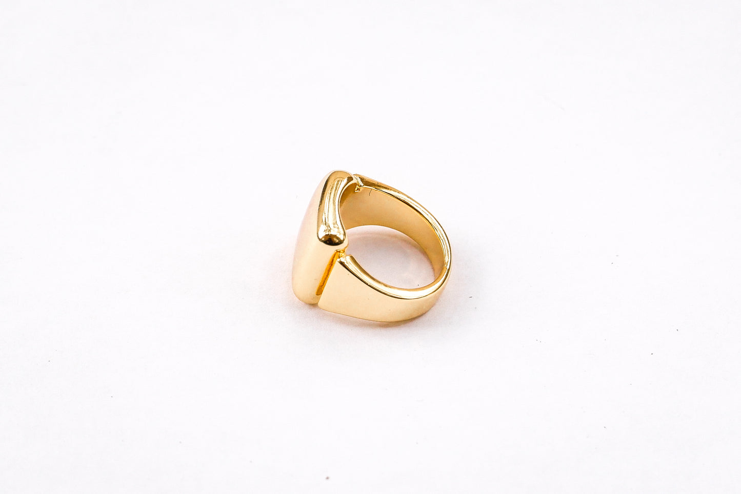 Amor bold ring on white backdrop  side view