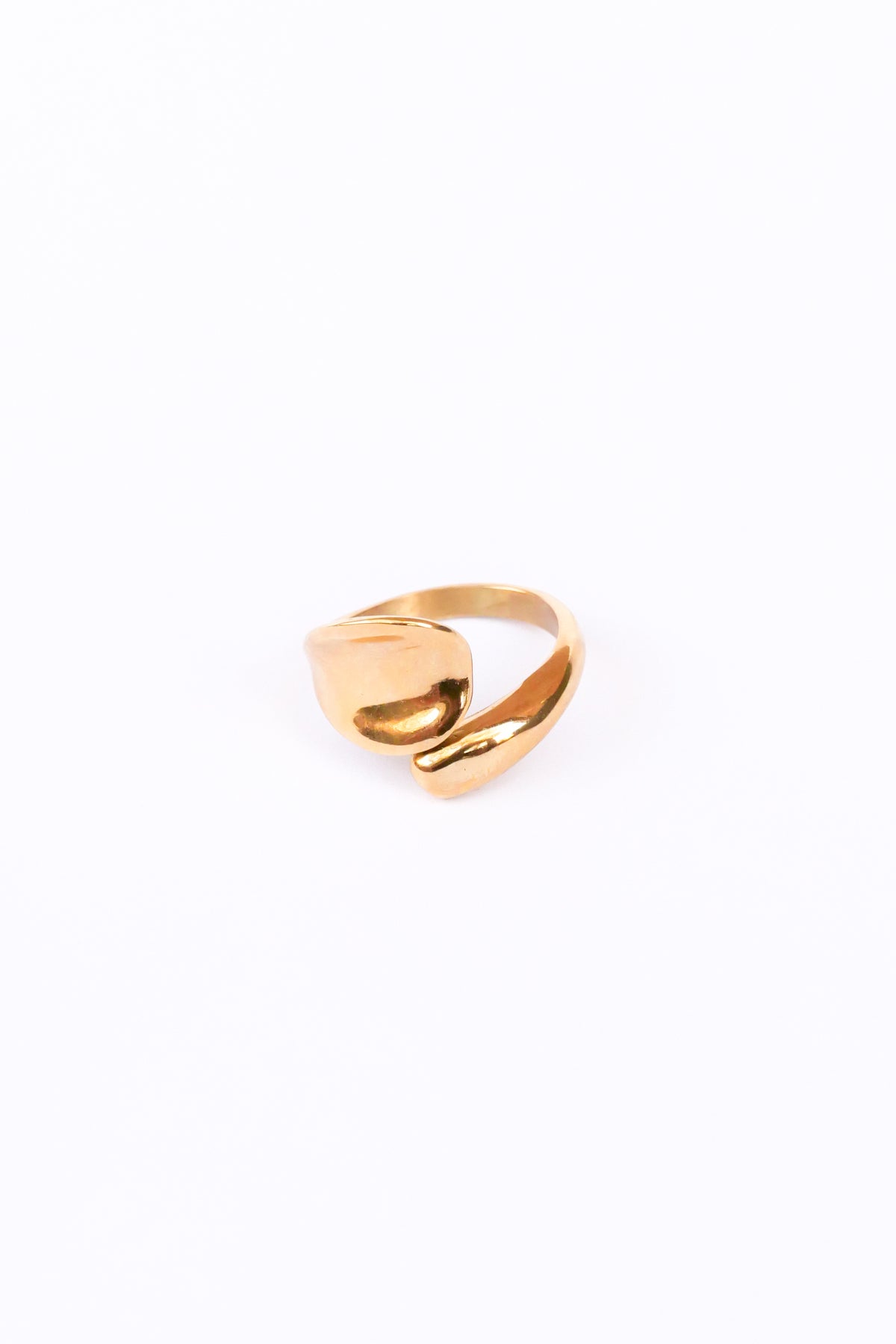 Front view of gold love open ring on white backdrop 